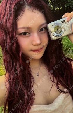 A Montage of ( ) OLIVE YOUNG LUCKY DRAW UMJI photocard image